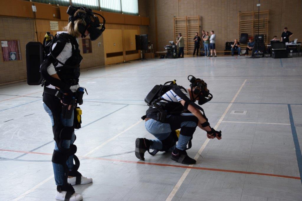 Two police officer wearing VR headsets and examinating the floor